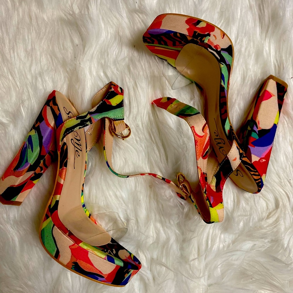 Multi colored heals. Never worn
